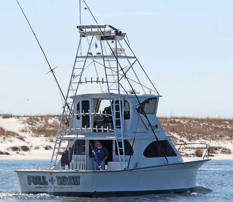 Fishing aboard the Full Draw HiLiiner boat on the water.