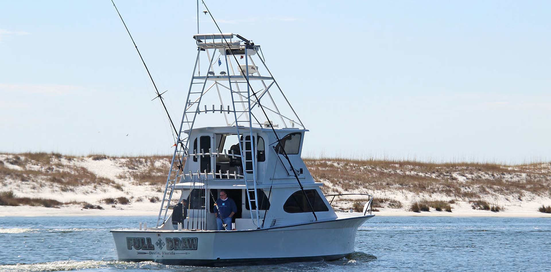 Fishing aboard the Full Draw HiLiiner boat on the water.